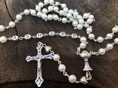 First Communion Rosary. Pick out the bead color, Our Father Beads, a rosary Centerpiece and crucifix and I will create a beautiful strong Rosary. I can personalize with a name as well. This Rosary is made the traditional chain Catholic way, each Bead is hand Beaded and chained, which makes the Rosary strong and very sturdy. It's made with Stainless steel findings, silver plated Findings, a traditional centerpiece and oTraditional crucifix. All of my Rosaries are handmade by myself. I take pride Cheap First Communion Rosary With 8mm Beads, Catholic Communion, Beautiful Rosary, Personalized Rosary, Custom Rosary, Rosary Prayer, 1st Communion, Praying The Rosary, Catholic Rosary