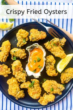 crispy fried oysters on a plate with dipping sauce