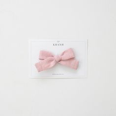 A classic look, our hand-tied bow was designed to fit newborns up to adulthood. These make for the perfect look on top knots and hair buns for both mother and daughters! Available on headbands or alligator clips. The headbands are one size fits all, so it'll grow with your little one. They're soft and stretchy. The clips are non-slip, and will be secured right sided. Handcrafted in Khanh studio. Material - Linen Approx. 4 1/4″ long x 2 1/4″ tall. Spot clean only. Flat lay dry. Iron low. Mother And Daughters, Top Knots, Imaginary Play, Hair Buns, Girl's Back, Mini Bows, Alligator Clips, One Piece Dress, Art Activities