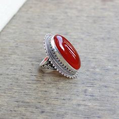 Gemstone - Natural Red OnyxSize - 15x30 mm OcalMetal - Sterling SilverRing Size- All sizes availableEach Ring made with Precision and love, these rings are perfect for everyday use and a perfect accessory to wear at work. Rings can be customized on request and gemstone can be switched to any other as per requirement. kindly visit my store to view the complete collection. Feel free to contact me for any queries regarding jewelry or for bulk order. The ring will be gift wrapped in a premium handma Oval Rings With Stone Setting As A Gift, Silver Carnelian Ring As A Gift, Silver Carnelian Rings For Gift, Spiritual Red Jewelry For Anniversary, Red Stone Setting Ring As Gift, Red Stone Setting Ring Gift, Red Gemstone Ring For Gift, Red Stone Setting Ring For Gift, Red Carnelian Ring As A Gift