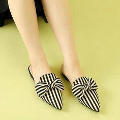 These flats' slide mules feature a pointed-toe design and decorative stripe printed with a bow. Great with shorts or chinos for a relaxed look. These Flats feature a pointed-toe, slip-on style finished for a bit of eye-catching movement every time you take a step. The simple silhouette and comfort make these flats a perfect everyday essential to pull together any outfit. It is a good choice for Parties, Offices, Casuals, Evenings, and Weekends. Summer Flats With Bow, Summer Bow Flats, Casual Flats With Bow And Pointed Toe, Casual Bow Flats With Pointed Toe, Trendy Spring Flats With Bow, Summer Bow Mules With Pointed Toe, Summer Workwear Flats With Bow, Spring Bow Slip-on Mules, Casual Summer Flats With Bow