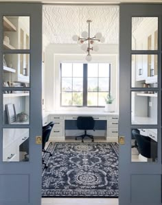 an open door leading to a home office with a rug on the floor in front of it