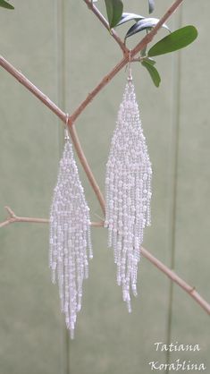 These handmade author's earrings are made of high-quality Czech beads and strong synthetic thread.In these unique earrings I use my author's scheme Abstract flowers minimalism . Color:white, clear. I will make these earrings for you in your color. I beg you not to copy my authoring Copy without my permission is prohibited For those who want to buy my copyright scheme for these earrings: https://www.etsy.com/uk/listing/930475988/brick-stitch-pattern-for-seed-bead?ref=shop_home_active_1 100% hand Fringe Earring, Beaded Chandelier Earrings, Earrings Chandelier, Brick Stitch Pattern, Lace Earrings, Beaded Chandelier, Earrings White, Earrings Long, Brick Stitch