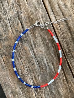 Handmade Americana Seed Bead Bracelet with a stainless steel lobster clasp with an extender! Handmade Beaded Bracelets For 4th Of July, 4th Of July Seed Bead Bracelets, Patriotic Beaded Bracelets For 4th Of July, Handmade Beaded Bracelets For 4th Of July Affordable, Patriotic Beaded Bracelets For Independence Day, Diy Friendship Bracelets Tutorial, Friendship Bracelets Tutorial, Friendship Bracelets Diy, Bracelets Handmade Beaded