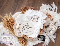 an image of baby clothes and other items on a blanket with the words born to be written