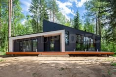 a small house in the middle of a forest