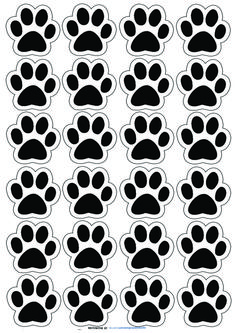 an animal paw printable pattern with black and white paws on the bottom half of it