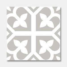 a gray and white tile pattern with four leaves on it's center, in the middle