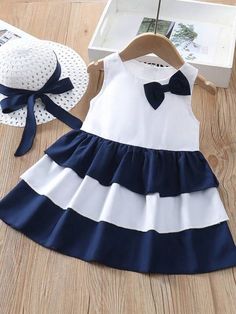 Baby Girls' Striped Sleeveless Dress With Bowknot Decoration | SHEIN USA White Sleeveless Dress With Bow, White Sleeveless Patchwork Dress For Beach, Sleeveless Beach Dress With Bow, Beach Sleeveless Dress With Bow, Beach Cotton Dress With Bow, Playful Sleeveless Dress With Bow, White Bow Dress For The Beach, White Bow Dress For Beach, White Beach Dress With Bow Detail