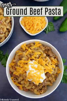 three bowls filled with ground beef pasta and cheese