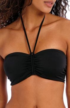 Enjoy poolside confidence in this halter bikini top designed with concealed underwire cups for shaping and support. Back hook-and-eye closure Ties at neck Lined 84% polyamide, 16% elastane Hand wash, line dry Imported Nylon Halter Top With Built-in Bra, Adjustable Halter Top With Built-in Bra For Pool, Adjustable Halter Top With Removable Bra Pads, Adjustable Nylon Halter Neck Swimwear, Adjustable Halter Neck Nylon Swimwear, Adjustable Underwire Halter Top For Sunbathing, Adjustable Padded Halter Top For Pool, Bandeau Halter Top With Adjustable Straps For Pool, Adjustable Black Bandeau Swimwear