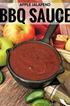 an apple jalapeno bbq sauce is in a cast iron skillet