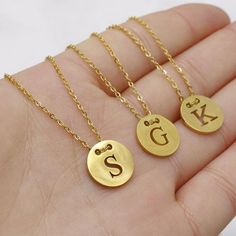 5pcs 12mm 45cm Polished Stainless steel Round Alphabet pendant Personalized Stamping Necklace,Steel Round Necklace,A-Z Alphabet Charm Chain✿ QTY: 5pcs✿ Pendant Size: 12mm✿ Chain Length:18"(45cm) ✿ Thickness: 1mm✿ Material: 316 Stainless Steel✿Color:  Gold✿ Nickel Free & Lead FreeTop Quality Triangle Necklaces, Mirror Finish, Smooth edges, Highly Polished Stainless Steel horizontal Triangle . ***These are top qualityTriangle With chains.***These come in Silver, Gold or Rose Gold.Stainless steel i Stainless Steel Charms Jewelry With Round Pendant, Stainless Steel Round Pendant Necklace Cadmium-free, Minimalist Stainless Steel Necklaces With Charms, Initial Pendant Metal Necklace For Gift, Gold Engraved Stainless Steel Charm Necklaces, Stainless Steel Charms Necklaces For Anniversary, Gold Engraved Charm Necklace In Stainless Steel, Stainless Steel Charm Necklaces With Adjustable Chain As Gift, Stainless Steel Charms Necklace For Anniversary