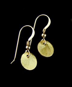 "This 24k vermeil brushed disc earrings are very cute and perfect for a night out, and just as perfect for everyday. Perfect. Simple yet rich, these earrings measure 1\" (25mm) from the top of the ear wire to the bottom , with disc shape measuring 3/8\"x3/8\" (8mmx8mm). Your item comes wonderfully boxed and wrapped so you can give it as a gift - or enjoy opening it as a gift yourself! Please read my policies page before purchasing. ADDITIONAL ITEMS: Here are the matching necklaces: https://www.e Disk Earrings, Gold Disc, Disc Earrings, Disc Necklace, Drop Dangle Earrings, Circle Necklace, Matching Necklaces, Ear Wire, Gift Christmas