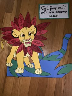 a paper cut out of a lion with the words on it