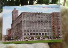 an old postcard shows the architecture of this building