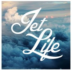 the words jet life are above clouds