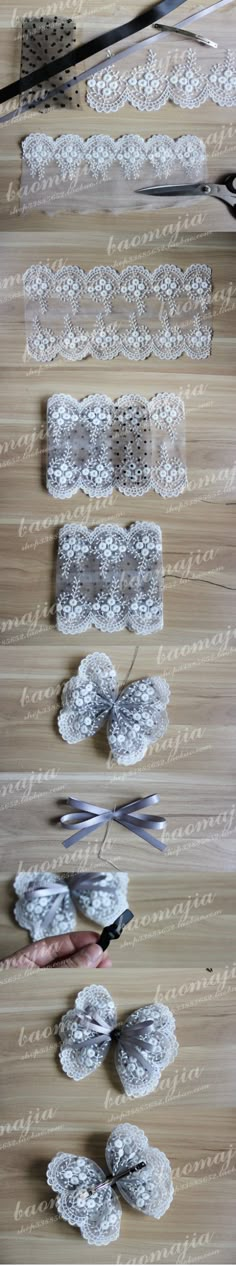 several pieces of white lace sitting on top of a wooden floor