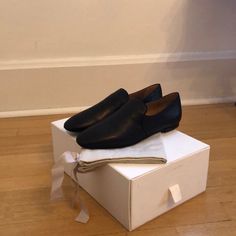 The Row Black Alys Slipper/Loafer. Nappa Leather. Size 40/U.S. 10. Nwt! Comes With Original Box And Dust Bags. Elegant Calf Leather Closed Toe Slip-ons, Calf Leather Pointed Toe Slip-ons For Work, Modern Slip-on Loafers For Galas, Chic Leather Shoes With Rubber Sole For Galas, Elegant Calf Leather Slip-ons With Closed Toe, Modern Flat Heel Loafers For Galas, Chic Slip-on Formal Loafers, Chic Slip-on Loafers For Formal Wear, Chic Almond Toe Slip-ons For Formal Occasions