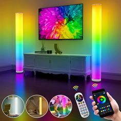 a person holding a remote control in front of a tv with colorful lights on it