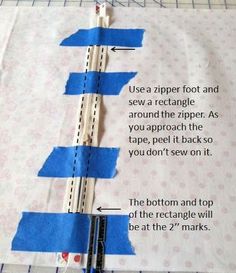 a piece of paper with blue tape on it and instructions for how to sew