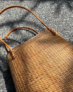 Experience the beauty of Bali with our artisanal rattan bag. Handmade with love, it's the perfect accessory for sun-soaked days and beach adventures. This stunning natural rattan bag is free shipping worldwide. The size of this rattan bag is approx 30 x 20 x 10 cm. Elevate your summer style to new heights with our exquisite rattan bag, beautifully crafted by artisans in the enchanting island of Bali. Each rattan bag is meticulously handmade with utmost care and attention to detail, resulting in Cowhide Rugs, Small Towel, Tropical Destinations, Rattan Bag, Beach Adventure, Boho Living, Boho Living Room, Must Have Items, Summer Staples