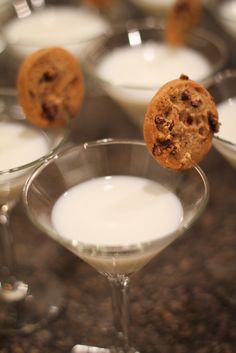 several glasses filled with different types of desserts