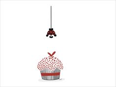 a cupcake with red sprinkles and a ladybug hanging from the top