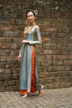 Discover the allure of our Vietnamese dress ao dai modern, enhancing your grace and elegance. #aodai #modernaodai #linen #linenclothing #linenclothes #traditionalaodai #linenaodai #linencollection #aodailinen #innovativeproducts #aodaivietnam #vietnamaodai #aodaiwedding Luxury Women's Ao Dai With Intricate Embroidery, Luxury Formal Ao Dai With Mandarin Collar, Luxury Silk Ao Dai For Spring, Luxury Ao Dai With Short Sleeve For Formal Events, Luxury Ao Dai With Mandarin Collar For Formal Occasions, Luxury Ao Dai With Mandarin Collar For Traditional Ceremonies, Luxury Women's Ao Dai For Festive Season, Luxury Traditional Ao Dai For Evening, Luxury Ao Dai With Floral Embroidery And Mandarin Collar