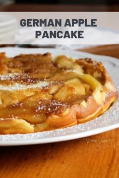 a close up of a plate of food on a table with the words german apple pancake