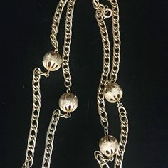 "This long lightweight delicate chain necklace is an antiqued gold color. The long cable chain measures 50\" inches and can be doubled over easily. Spaced throughout the chain are seven, open work filigree antiqued gold beads that measure .5 inch. It has a nice weight to it and light weight. There are no makers marks on this necklace. This metal necklace is circa 1950 and made by a high end costume jewelry maker of the time.  The first half of the 20th century was the heyday for well made costume jewelry sold from fine department stores to Woolworth, usually made in Europe or the United States. The manufacture and quality of costume jewelry deteriorated in the latter part of the century making this era the last with enduring products.  This piece of jewelry is sent in a bubble pack envelop Luxury Antique Jewelry With Wheat Chain, Luxury Vintage Wheat Chain Necklace, Costume Jewelry Makers, Made Costume, Vintage Gold Chain, Pyrite Pendant, Czech Glass Necklace, Metal Necklace, Clover Necklace