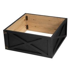 a wooden box with black paint and wood trimmings on the sides, sitting in front of a white background