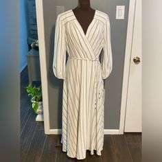 This Calvin Klein Women's Dress In Size 14 Is Perfect For Any Occasion. The Dress Features A Stylish Striped Pattern, A Flattering V-Neckline, And Long Balloon Sleeves. It Has A Zip Closure And A Fit & Flare Style That Will Make You Feel Confident And Beautiful. The Dress Is Made Of High-Quality Polyester Material And Is Perfect For Summer And Spring Seasons. It Can Be Worn For Travel, Weddings, Parties, Or Casual Occasions. The Dress Is Not Vintage And Was Made In Vietnam. Original Price $139 M Elegant Calvin Klein Maxi Dress For Spring, Elegant Calvin Klein Spring Maxi Dress, Chic Calvin Klein Spring Maxi Dress, Calvin Klein Summer V-neck Midi Dress, Chic Calvin Klein V-neck Midi Dress, Chic Calvin Klein Midi Dress With V-neck, Elegant Calvin Klein Dress For Day Out, Calvin Klein Fitted Dress For Day Out, Chic Calvin Klein Dresses For Day Out