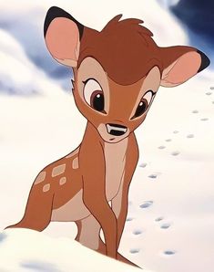 a deer that is standing in the snow with it's eyes open and nose wide