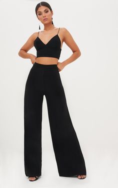 Featuring figure skimming and curve enhancing slinky fabric, these ultra-chic palazzo trousers are a complete wardrobe staple. Team with the matching bralet and killer platforms for serious style vibes. Length approx 86.5cm/34 (Based on a sample size UK 6) Model wears size UK 6/ EU 34/ AUS 6/ US 2 Chic Wide Leg Elastane Pants For Party, Fitted Wide Leg Pants For Party, Elastane Wide Leg Pants For Night Out, High-waisted Elastane Wide Leg Pants For Parties, High-waist Wide Leg Elastane Pants For Night Out, Stretch Wide Leg Party Pants, High Waist Wide Leg Elastane Pants For Night Out, High Waist Elastane Wide Leg Pants For Night Out, Stretch Elastane Wide Leg Pants For Party