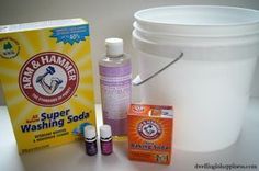 Chemical-Free Liquid Laundry Detergent 2 gallon bucket 2 gallons water 1/2 cup Super Washing Soda (found at any grocery store I believe!) 1/2 cup Baking Soda 3/4 cup castile soap (I use Dr. Bronner’s in lavender) 30 drops of your favorite essential oils (I used lavender and “joy” blend) Large wooden/plastic spoon to stir (not pictured) 2 1-gallon glass containers Homemade Laundry Detergent Liquid, Liquid Laundry Soap, Diy Soap Bars, Laundry Soap Homemade