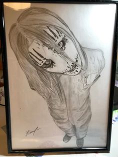 a pencil drawing of a girl with long hair and big eyes wearing a hoodie