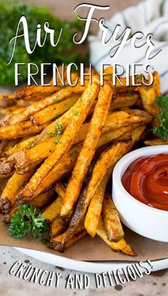 air fry french fries on a plate with ketchup and parsley in the background