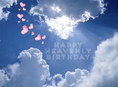 there are hearts floating in the sky with words happy heavenly birthday written on it,