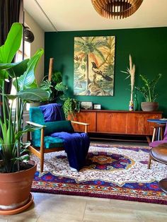 a living room filled with lots of plants and furniture