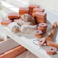 the table is covered with different types of crafting supplies