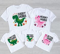 three t - shirts with the words daddysauruss and baby dinosaurs printed on them