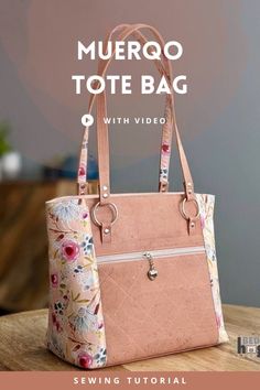 a pink purse with floral print on it and the words, muergo tote bag with video