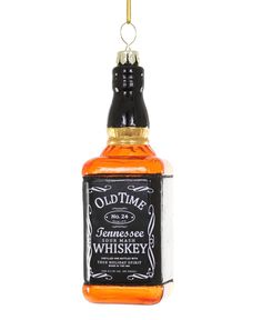 an ornament shaped like a bottle of whiskey hanging from a chain on a white background