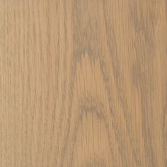 closeup of wood grained surface with light brown stain