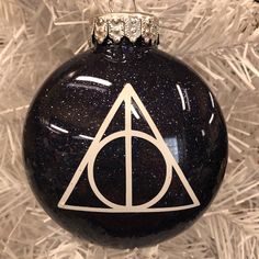 a harry potter ornament hanging on a christmas tree