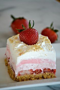 there is a piece of cake with strawberries on it