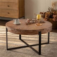 a coffee table sitting on top of a carpeted floor