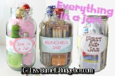 three jars filled with different types of candy and candies in each jar are labeled everything is fun