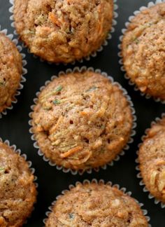 a bunch of muffins sitting on top of a table